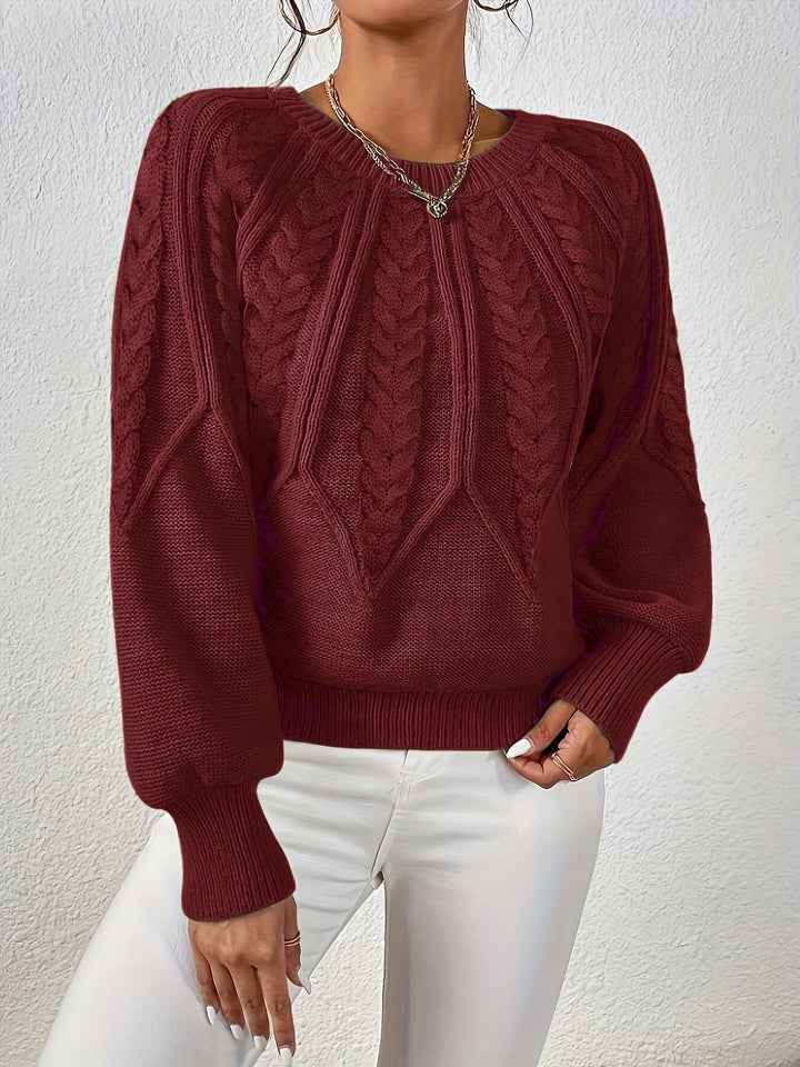Maglione invernale donna a trecce, maniche a palloncino. Caldo e di tendenza.