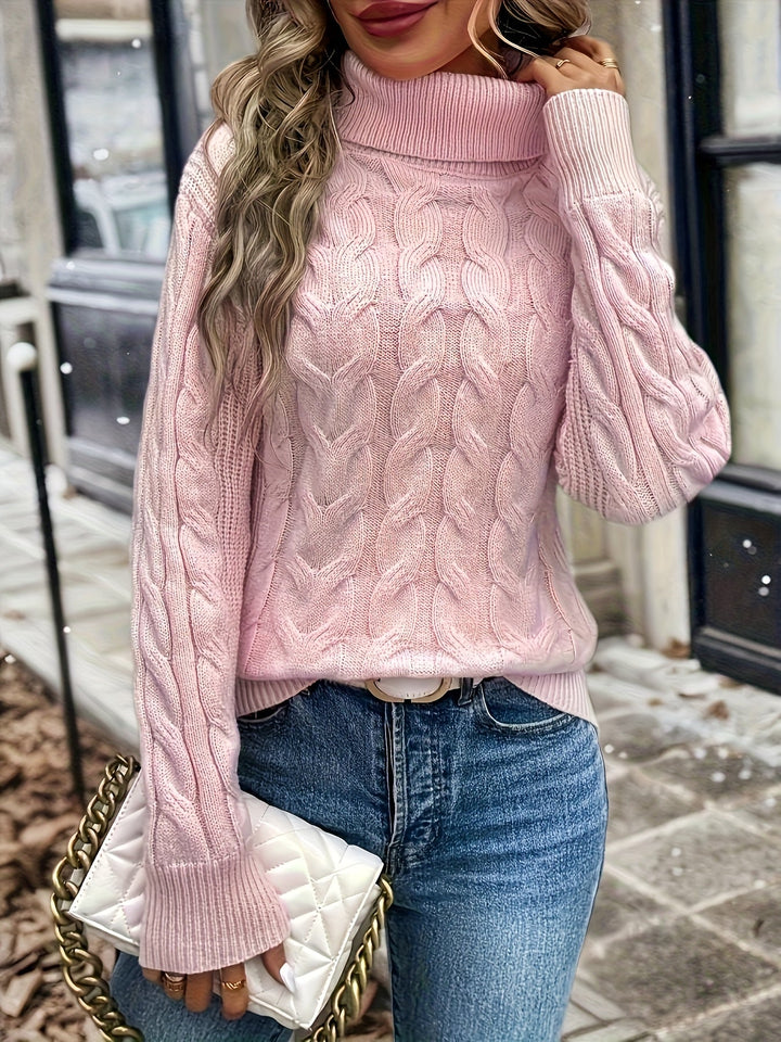 Maglia donna invernale con trecce e collo alto. Un must-have per la stagione fredda.