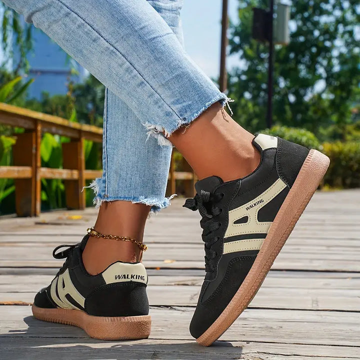 Sneakers donna retro chic nere/caffè. Calzature casual con design elegante a contrasto, perfette per ogni giorno.
