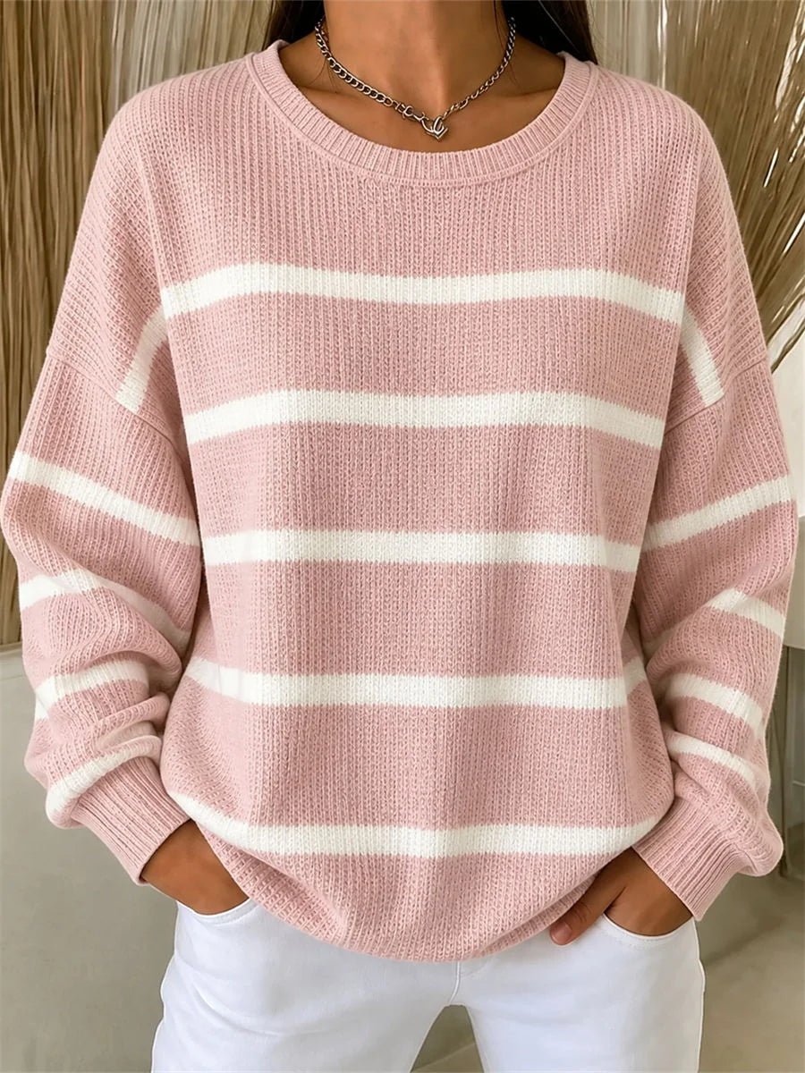 Felpa donna casual rosa a righe, girocollo e vestibilità comoda. Perfetta per look moda primavera/autunno.
