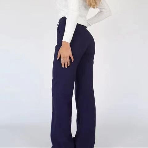 Pantaloni da ufficio donna a vita alta, taglio dritto. Abbigliamento professionale e comodo.
