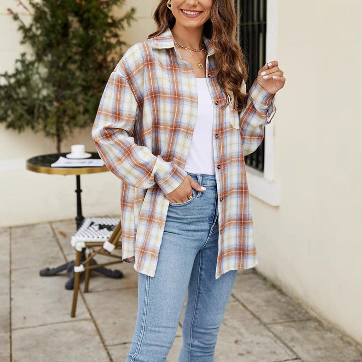 Camicia donna a quadri lunga, manica lunga. Top casual versatile con bottoni, perfetta per outfit quotidiani.