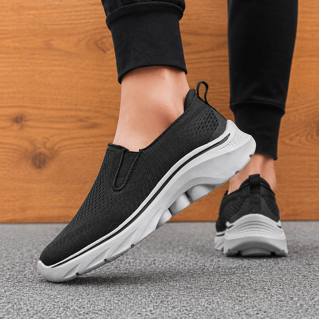 Scarpe sportive uomo slip-on, comode e traspiranti, ideali per un look casual e attività quotidiane.