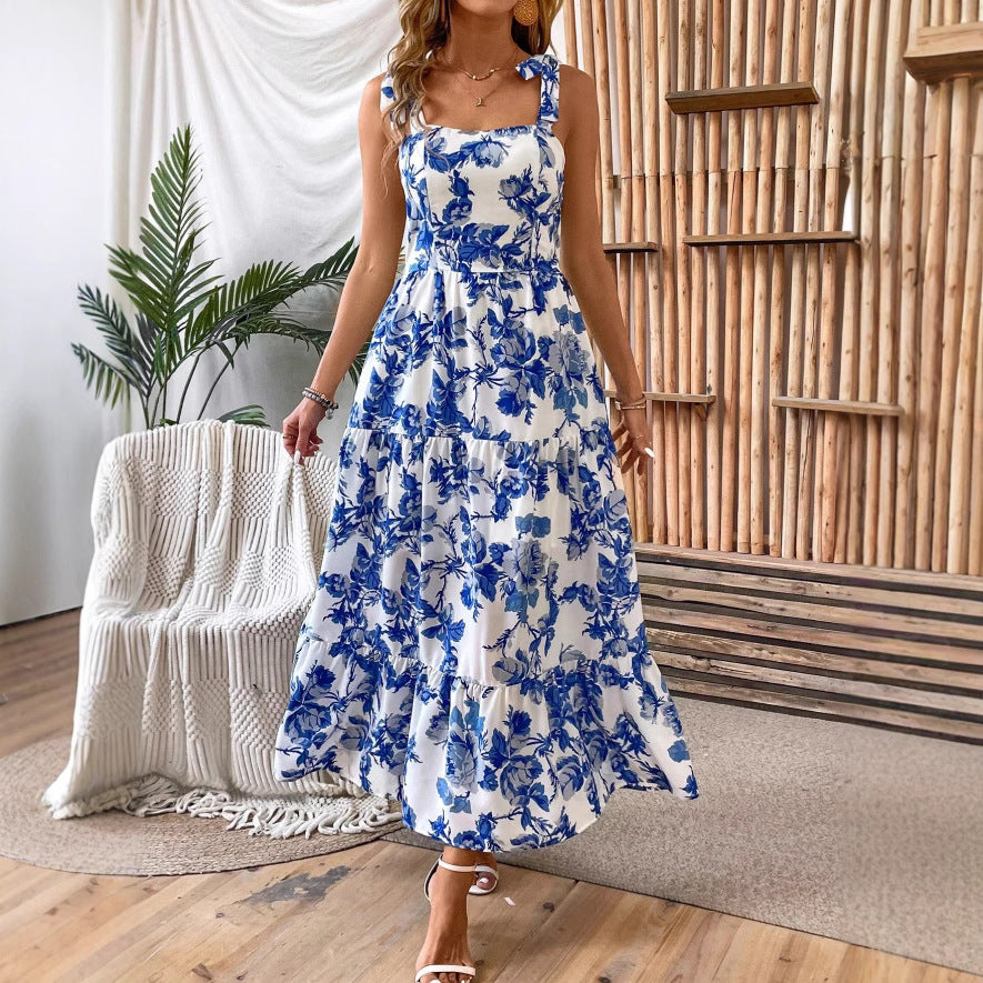 Vestito midi rosa estivo da donna stampato, con spalline sottili, perfetto per vacanze e look casual.