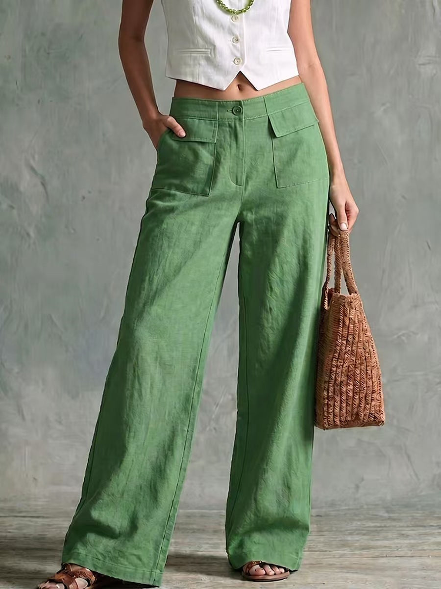 Pantaloni donna larghi a vita alta, vita elastica, disponibili in varie tinte unite, moda primavera.
