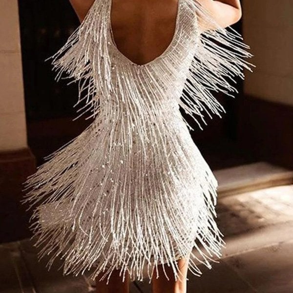 Mini abito da sera vintage flapper con paillettes brillanti, ideale per un look elegante e scintillante.