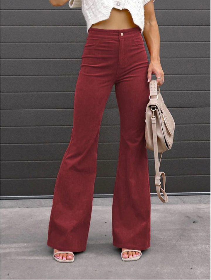 Pantaloni donna svasati rétro a vita alta in velluto a coste, perfetti per un look elegante quotidiano.