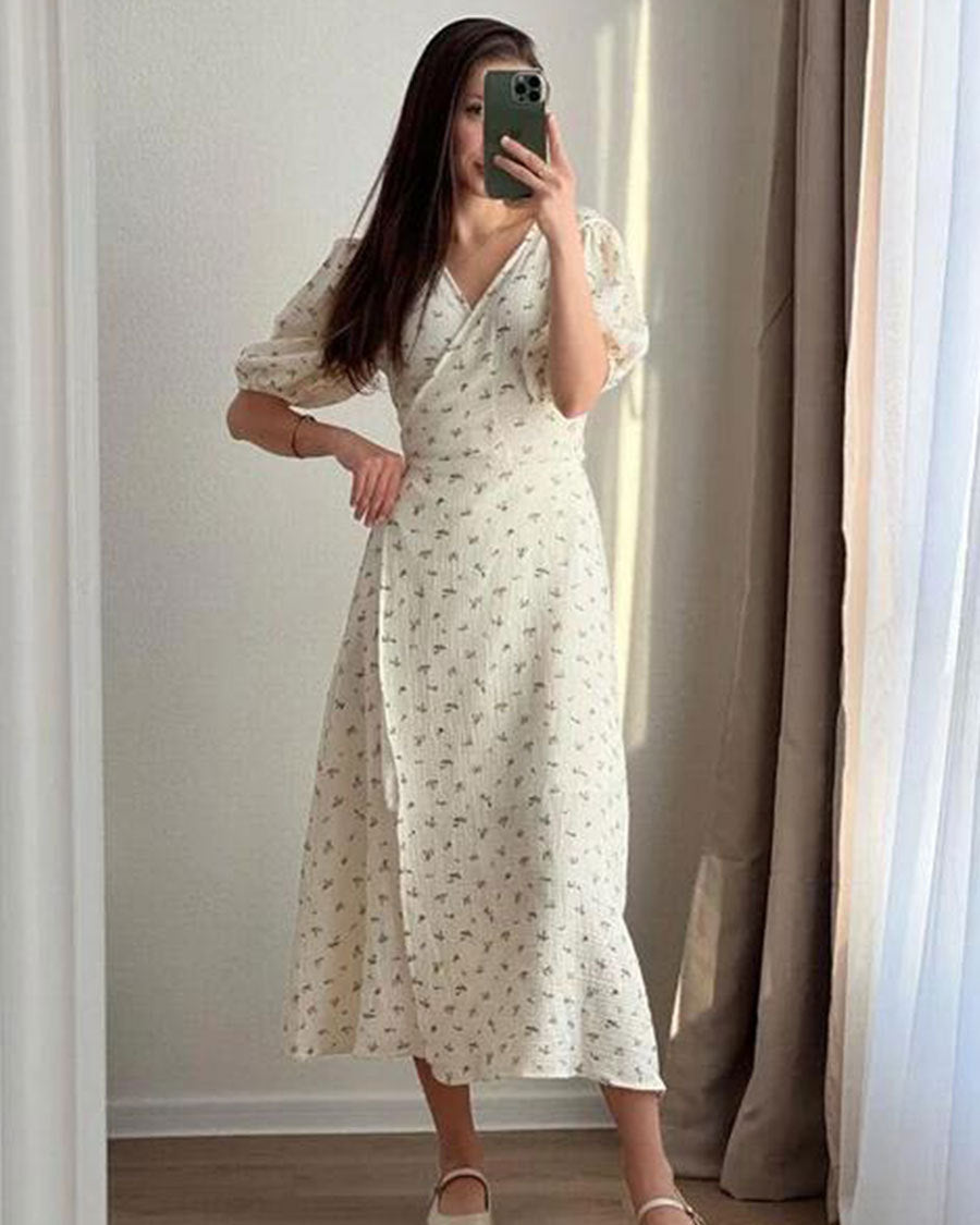 Abito estivo donna floreale giallo con scollo a V e maniche corte, elegante e casual.