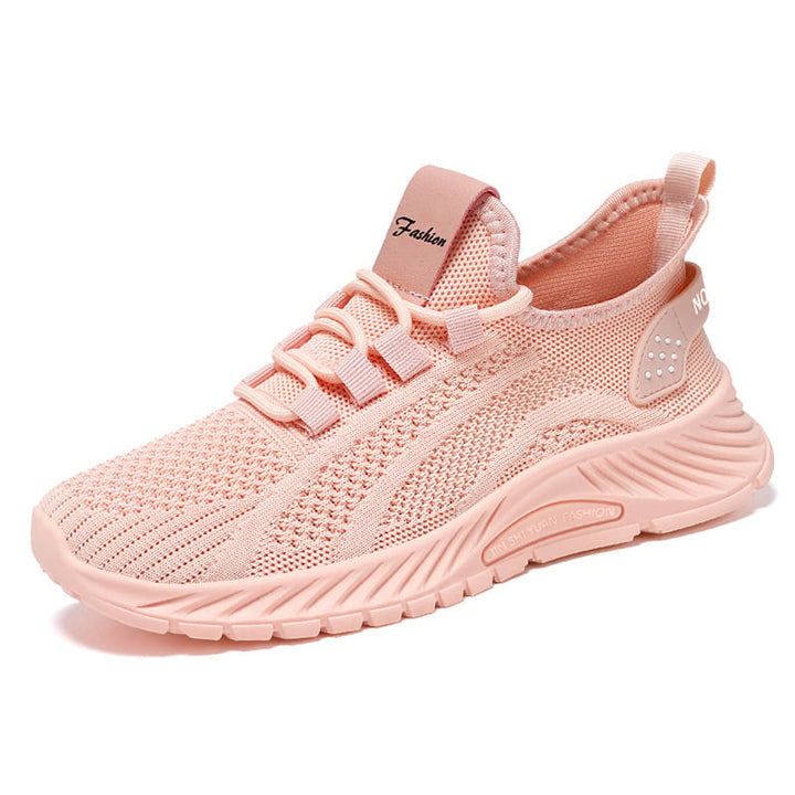 Sneakers donna casual nere con lacci, design moderno. Perfette per un look sportivo e comodo in città.
