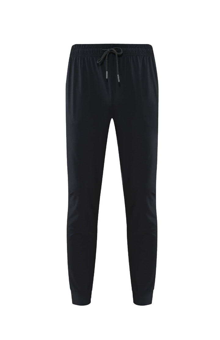 Pantaloni uomo sportivi larghi per fitness, allenamento o outfit casual. Traspiranti, ideali primavera/estate.