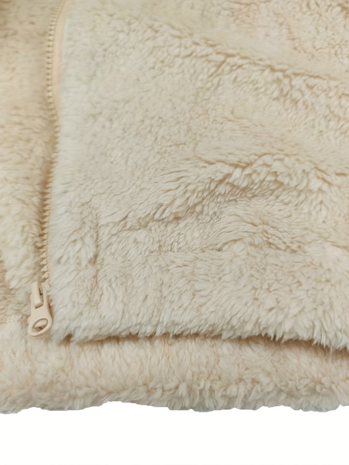 Morbido gilet donna in pelliccia teddy spento bianco, con zip. Un capo caldo e comodo, senza maniche, per l'inverno.