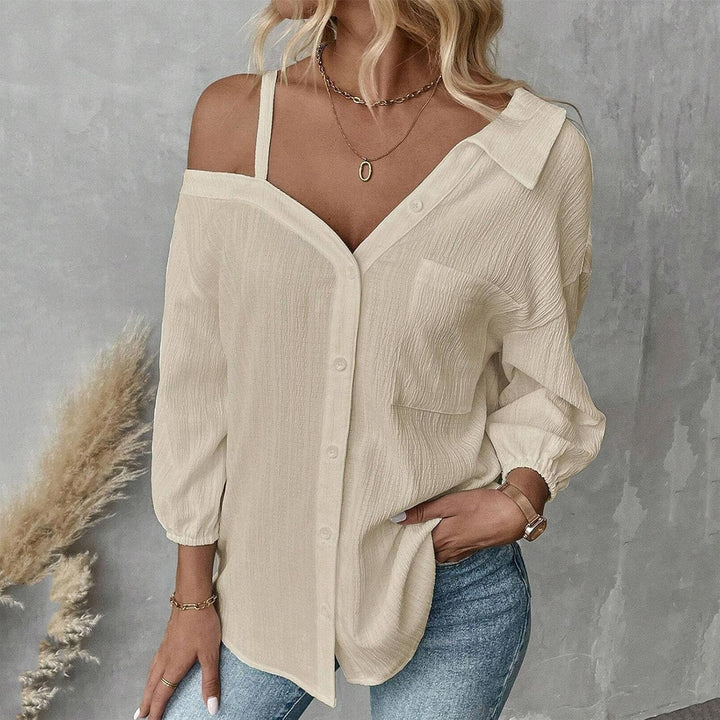 Top monospalla nero da donna, elegante e versatile per un guardaroba essenziale.