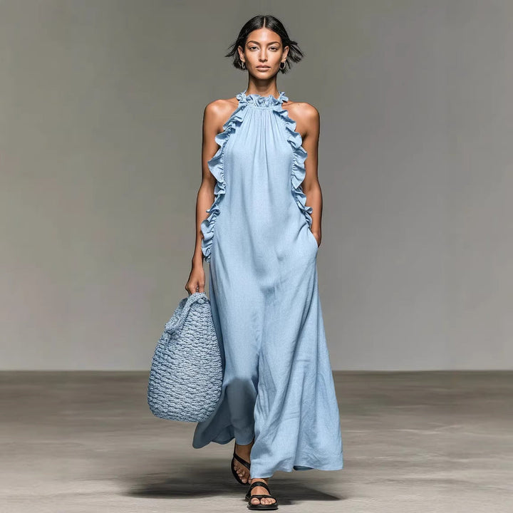 Elegante abito da sera lungo donna. Scollo all'americana e balza. Ideale per cerimonie e resort wear estivo.