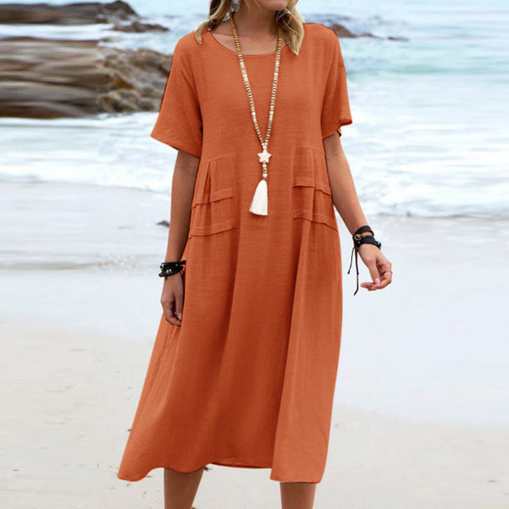 Vestito midi estivo casual da donna in cotone lino, ideale per vacanze e spiaggia. Comodo e ampio.
