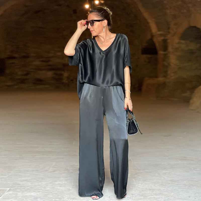 Set donna casual autunnale con top scollo a V e pantaloni larghi a vestibilità ampia. Perfetto per outfit comodi.