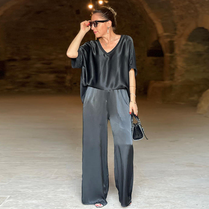 Set donna casual autunnale con top scollo a V e pantaloni larghi a vestibilità ampia. Perfetto per outfit comodi.