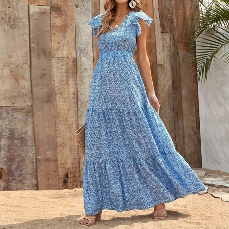 Abito estivo bohemien donna, maxi dress scollo a V, stampa floreale colorata. Perfetto per vacanze casual.