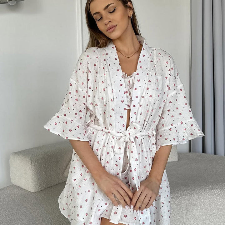 Pigiama donna elegante due pezzi con top a tubo e shorts, perfetto per il relax e la notte in ogni stagione.