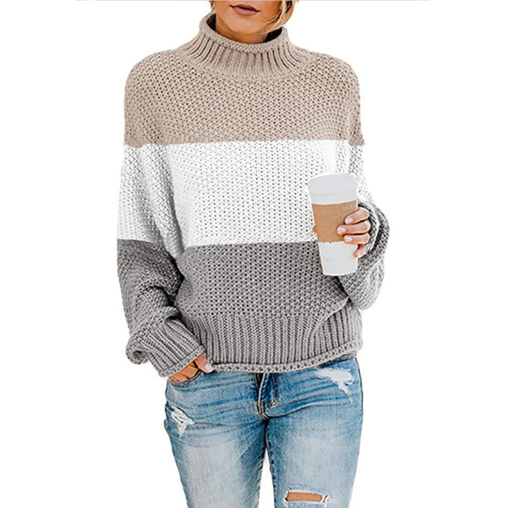 Maglione donna elegante con collo alto e blocchi di colore contrastanti. Un capo must-have per la moda invernale.