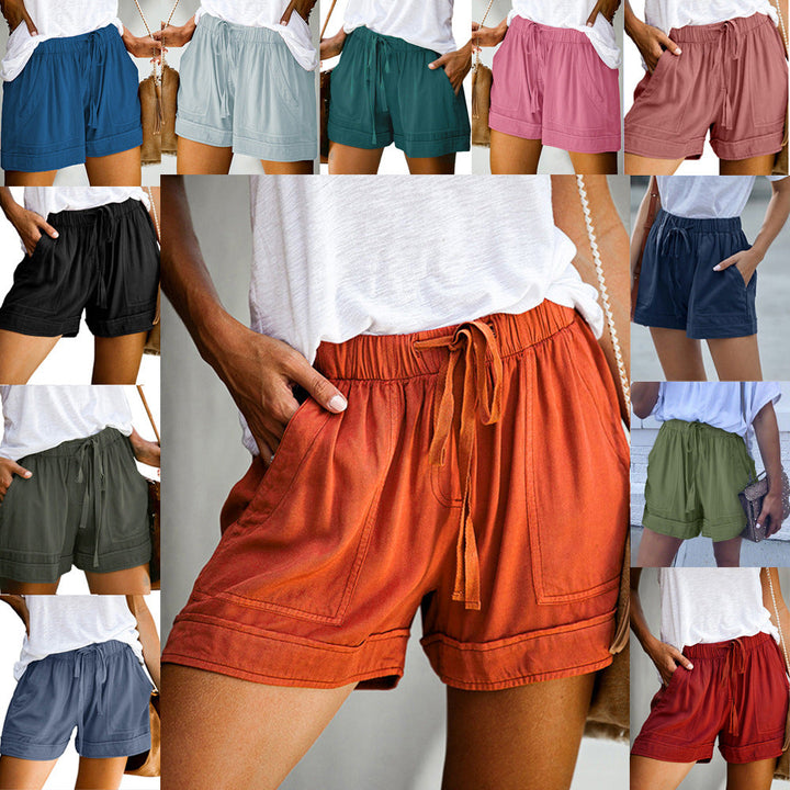 Eleganti pantaloncini donna vita alta gamba ampia, perfetti per look estivi e alla moda. Tessuto leggero.