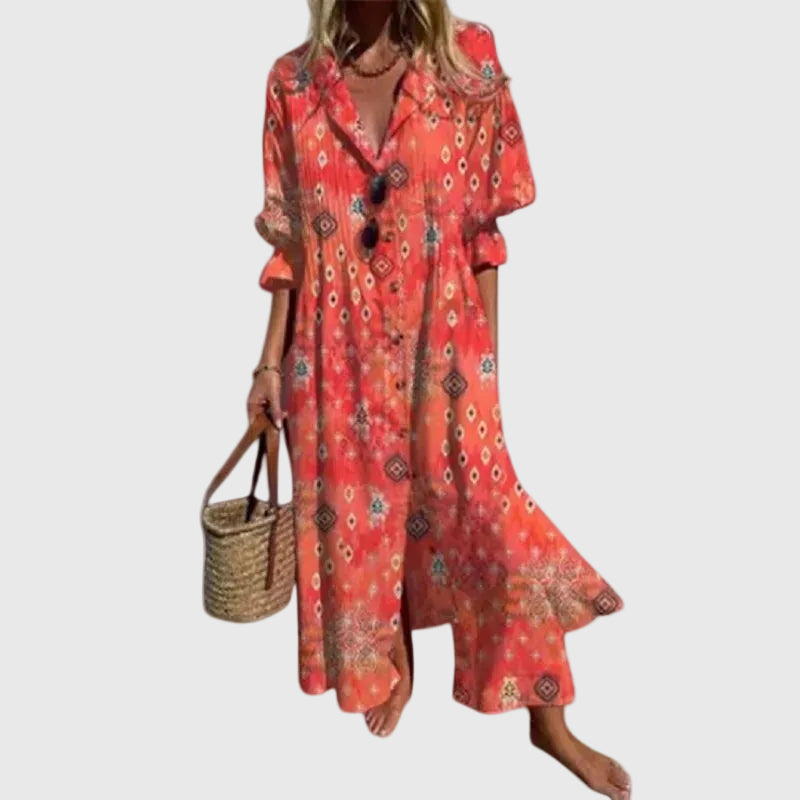 Maxi vestito donna con stampa floreale vivace, stile boho chic per un look estivo.