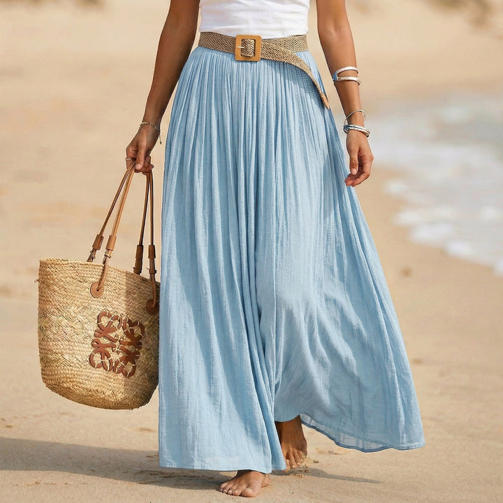 Elegante abito estivo donna, maxi e svasato con vita morbida. Ideale per la moda mare.