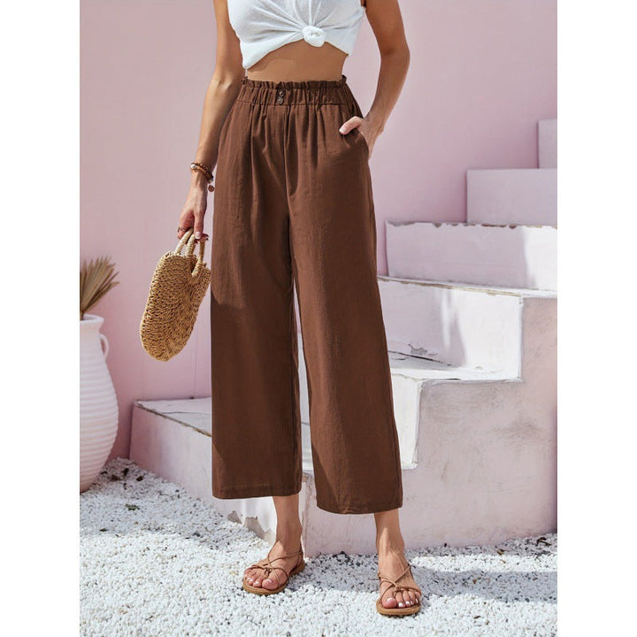 Pantaloni neri donna a vita alta con gamba dritta, un must-have casual e streetwear per la primavera.