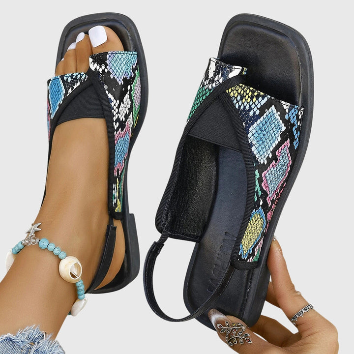 Sandali donna bassi slingback, design aperto e confortevole, scarpe estive ideali per ogni occasione casual.