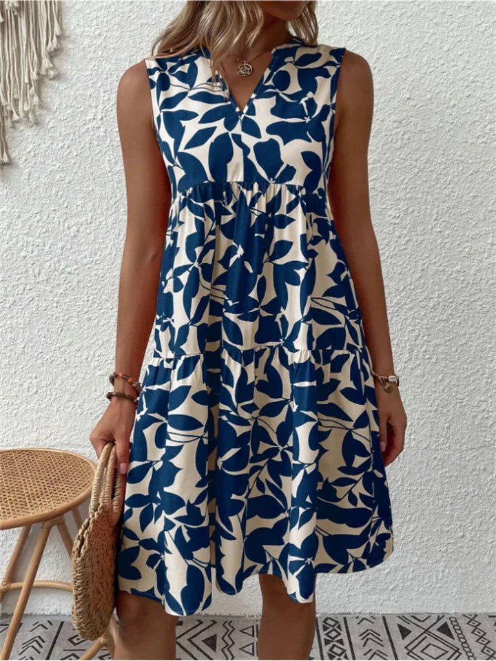 Elegante abito midi da donna floreale, taglio svasato per massimo comfort e versatilità estiva.