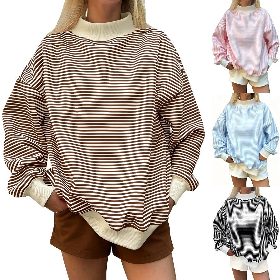 Maglione donna a righe morbido, maniche lunghe, perfetto per look casual autunnali di tendenza e comfort.