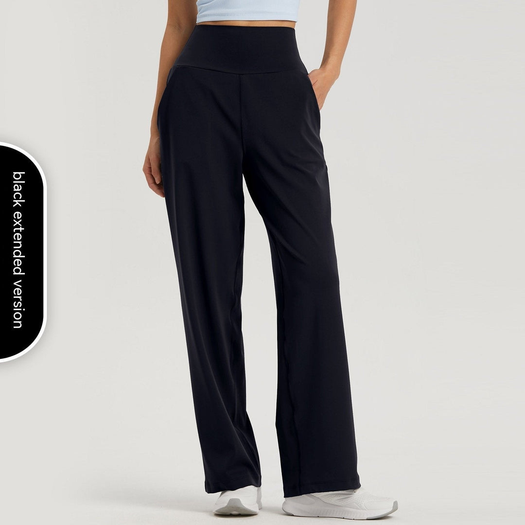 Pantaloni sportivi donna a vita alta, gamba ampia per yoga e fitness. Offrono supporto e stile senza sacrificare il comfort.