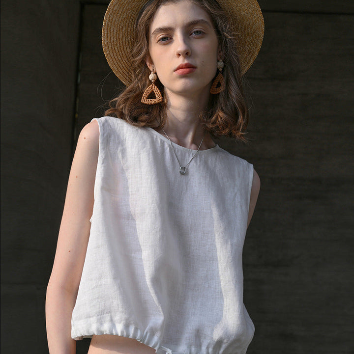 Top donna senza maniche casual, coulisse regolabile, dettagli a contrasto. Stile estivo versatile per comfort.