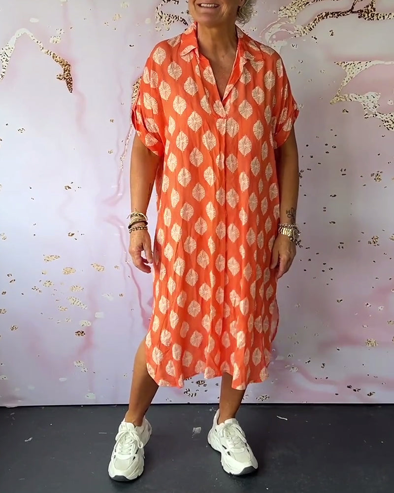 Abito estivo donna midi con scollo a V, perfetto per vacanze. Tessuto leggero, comodo e colori vivaci per l'estate.