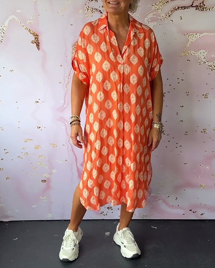 Abito estivo donna midi con scollo a V, perfetto per vacanze. Tessuto leggero, comodo e colori vivaci per l'estate.