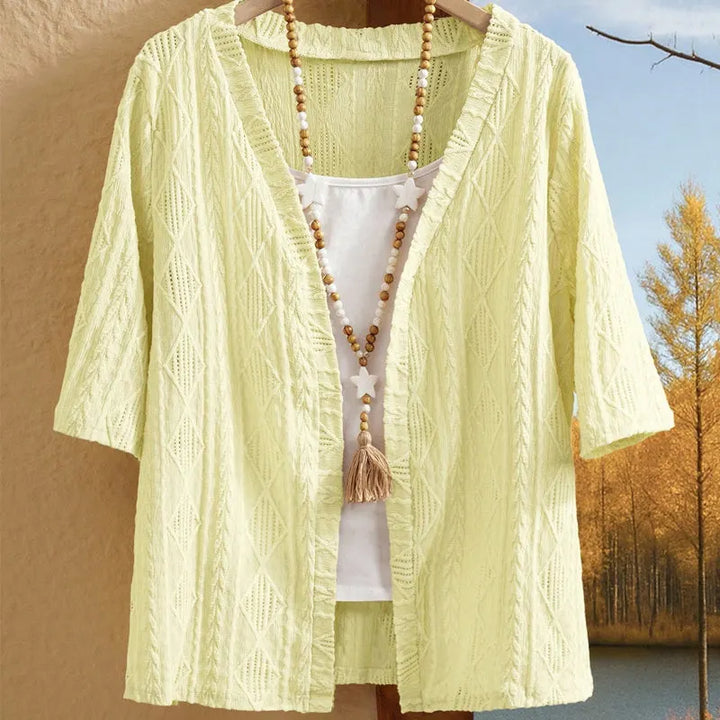 Cardigan donna open front, traforato, leggero e con maniche 3/4. Completa il tuo look.