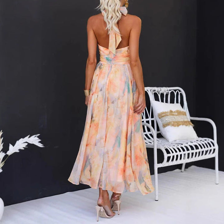 Vestito lungo donna senza maniche con fantasia corallo. Ideale per la moda mare e uno stile vacanza.