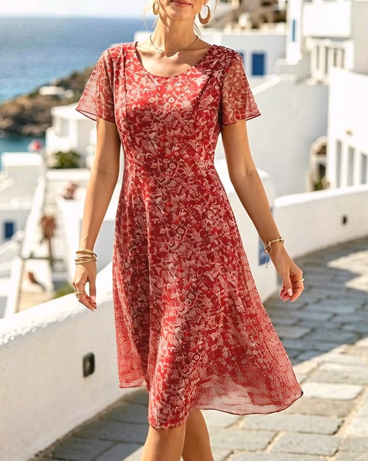 Elegante abito floreale A-line estivo in cotone, perfetto per le vacanze e la spiaggia.