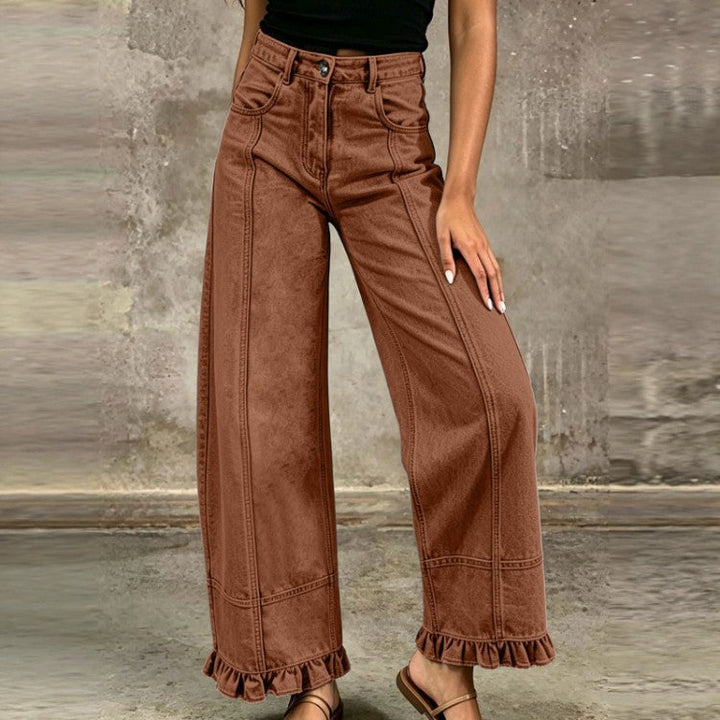 Jeans donna vita alta gamba larga, perfetti per un look casual streetwear moderno.