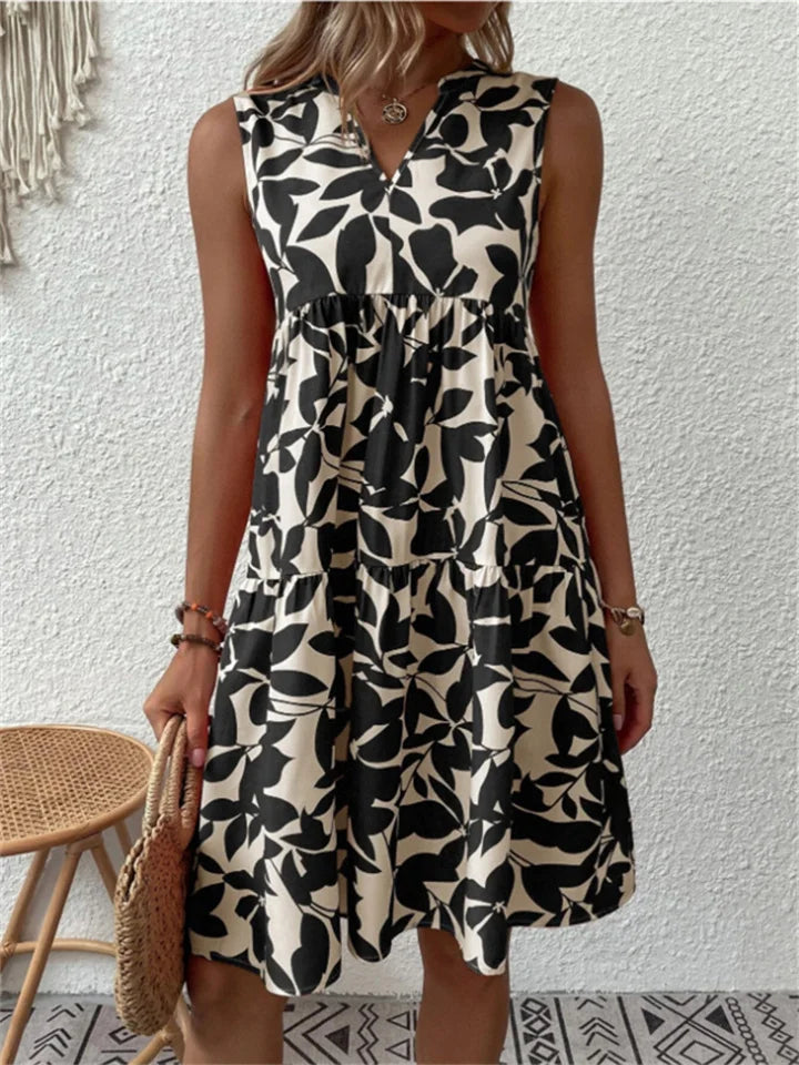 Abito da donna midi floreale svasato, leggero e confortevole, ideale per un look estivo elegante.