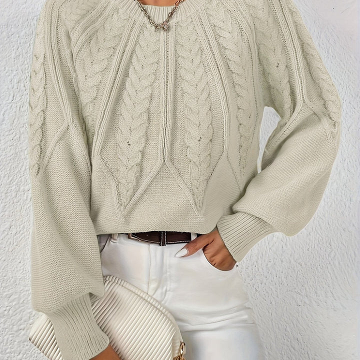 Maglione a trecce, maniche a palloncino. La scelta comoda per ogni donna.