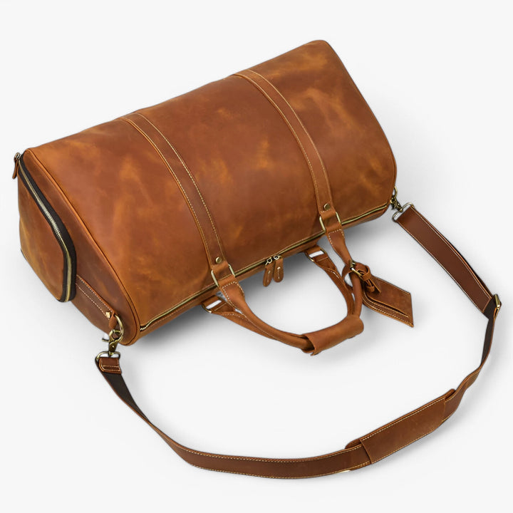 Borsa da viaggio sintetica marrone 55cm, unisex e robusta, con ampio scomparto interno.