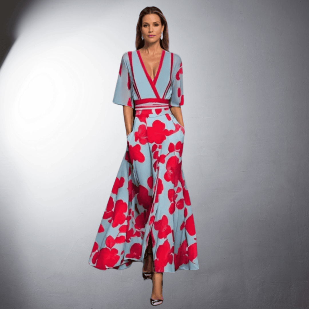 Abito estivo floreale azzurro e rosso per donna, con scollo a V e maniche corte. Stile casual ed elegante.