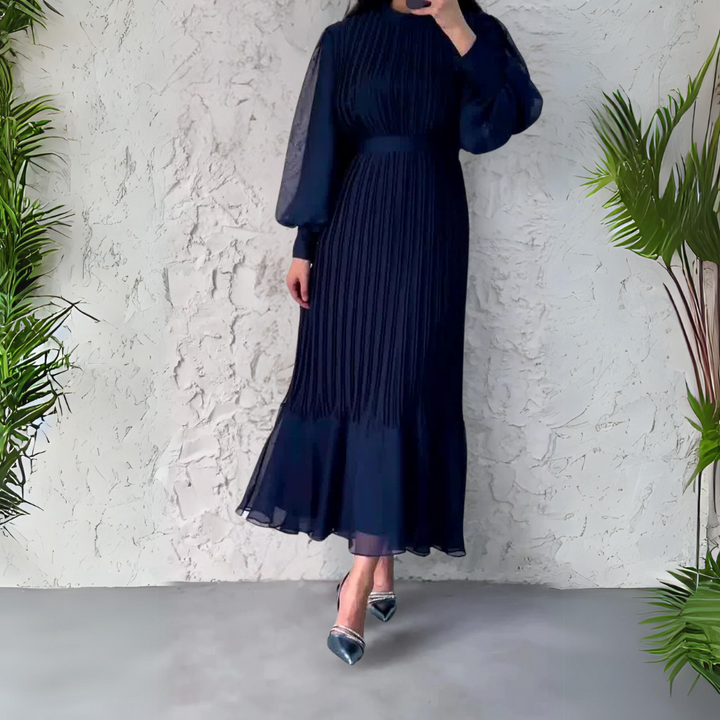 Abito donna elegante con maniche a palloncino e design a pieghe, ideale per eventi serali e cerimonie.