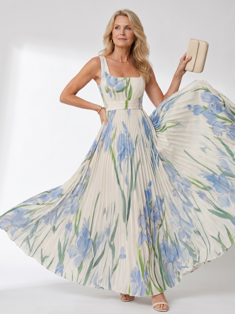 Versatile abito estivo midi plissettato per donna con scollo quadrato, senza maniche. Perfetto per la vacanza.