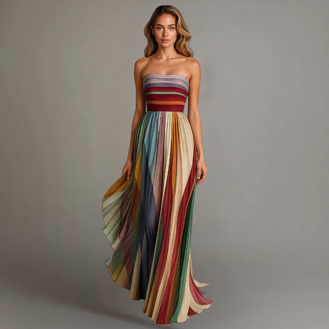 Abito lungo donna plissettato multicolore senza spalline, ideale per serate estive eleganti e moda casual chic.