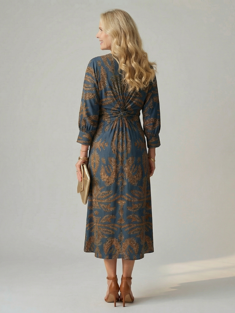 Donna: abito midi incrociato, scollo a V, silhouette valorizzante, stile naturale.