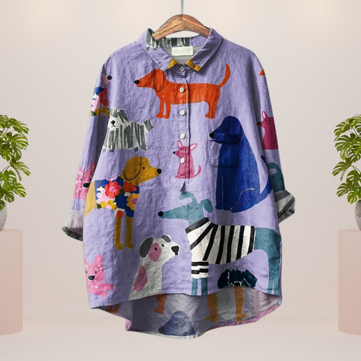 Maglia viola da donna a maniche lunghe con adorabile stampa di cani, perfetta per un look casual-elegante primaverile.