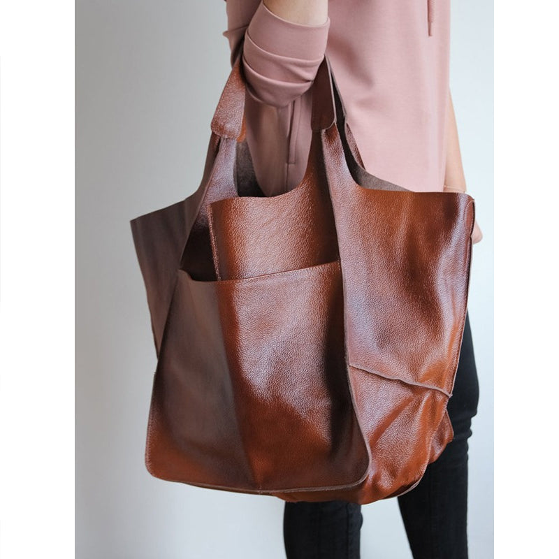 Borsa a tracolla vintage da donna, con scomparti interni per una migliore organizzazione.