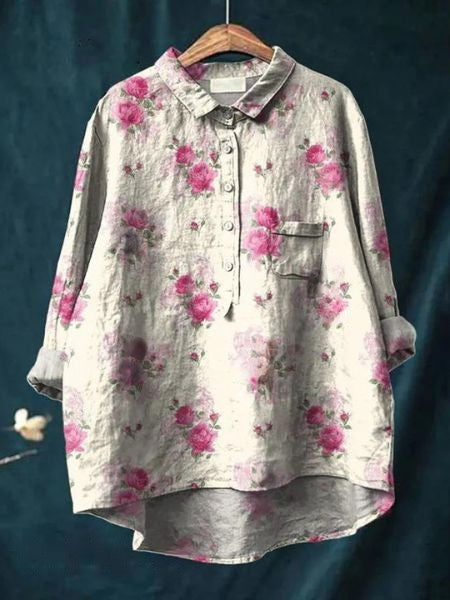 Blusa a fiori da donna con fantasie vivaci, ideale per l'estate e look freschi.