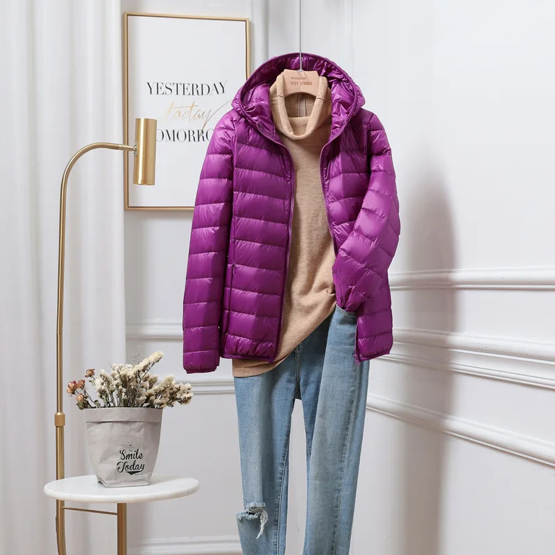 Giacca donna elegante con cappuccio, trapuntata e leggera. Ideale per la mezza stagione.